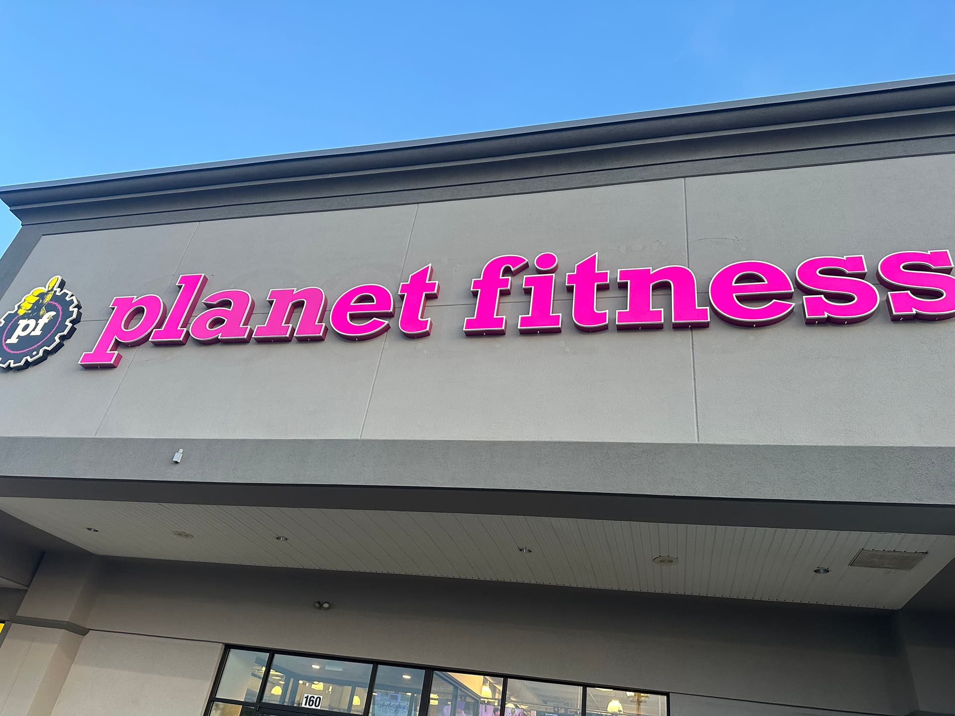 Planet Fitness Sign Lighting Fixed and Back in Business image