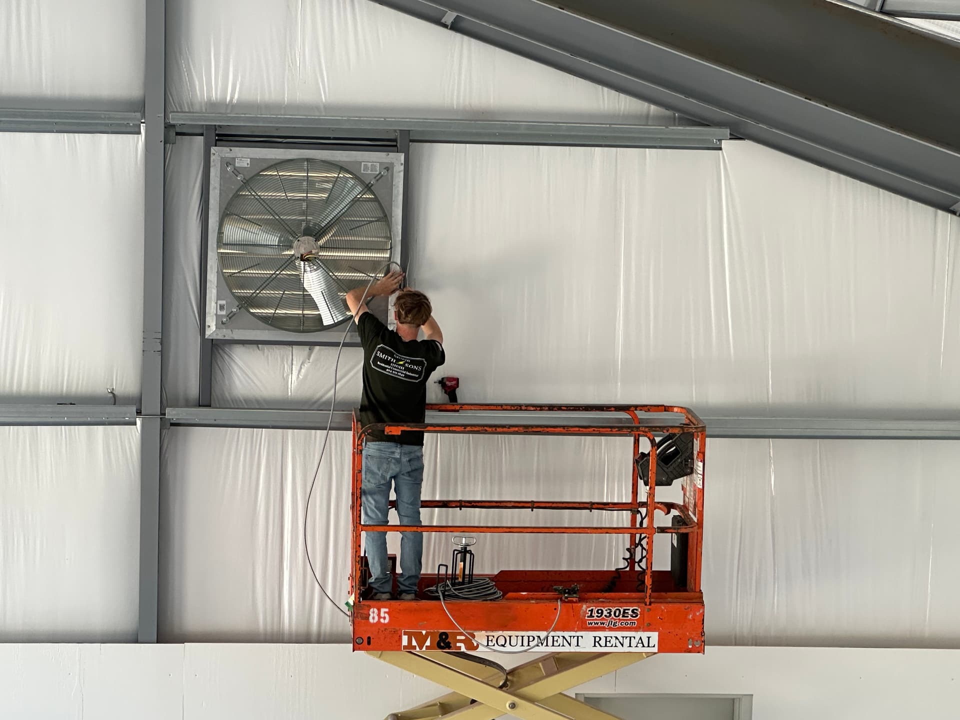 Installing Electrical Systems in Mayesville's New Shop image